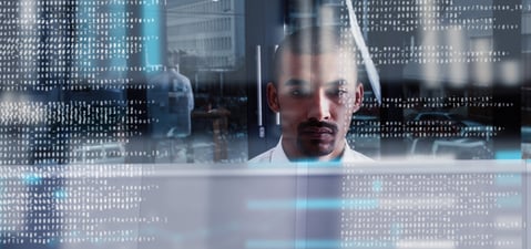 IT Manager Reviewing Code