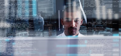 IT Manager Reviewing Code