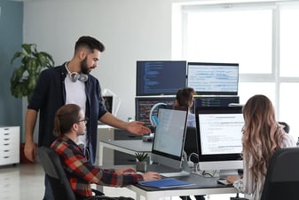 Security team working on computers