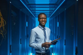 man working in a security operations center