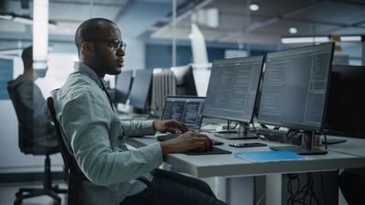 Software developer using cybersecurity tools