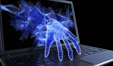 digital hands coming out of the screen of a laptop