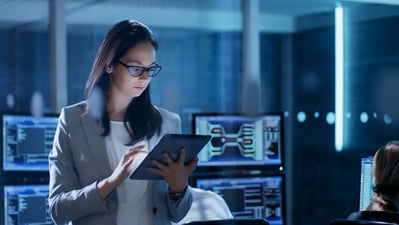 woman-from-cybersecurity-team-holding-a-tablet-siem-concept