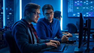 cybersecurity-team-checking-audit-logs-in-a-computer