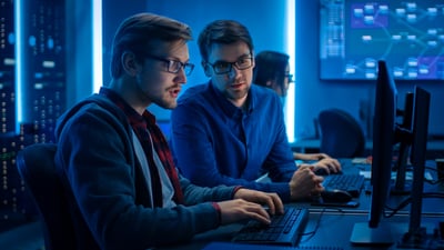 cybersecurity-team-checking-audit-logs-in-a-computer