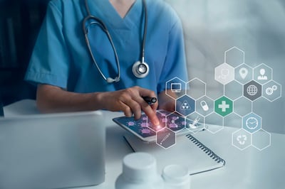 doctor-wearing-a-stethoscope-while-using-a-tablet-healthcare-cybersecurity-concept