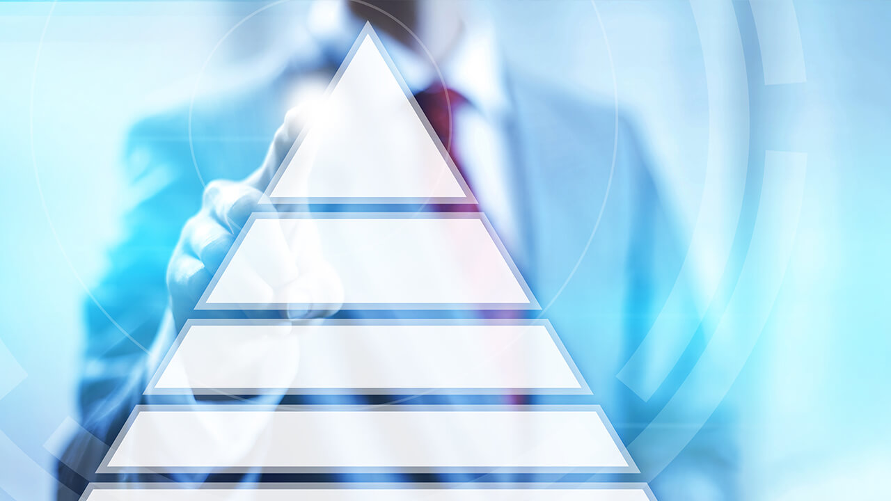 pyramid with a person in a suit 
