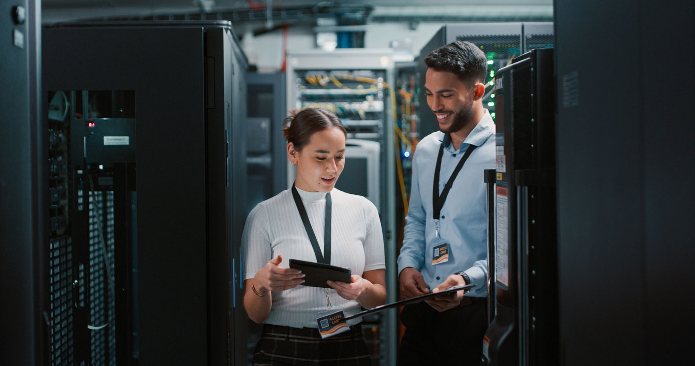 IT professionals working in a server room