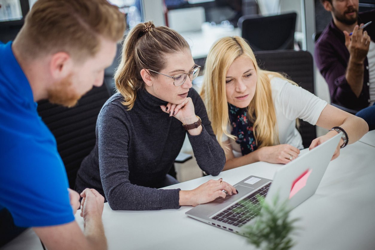 cybersecurity-team-working-on-laptop-in-an-office